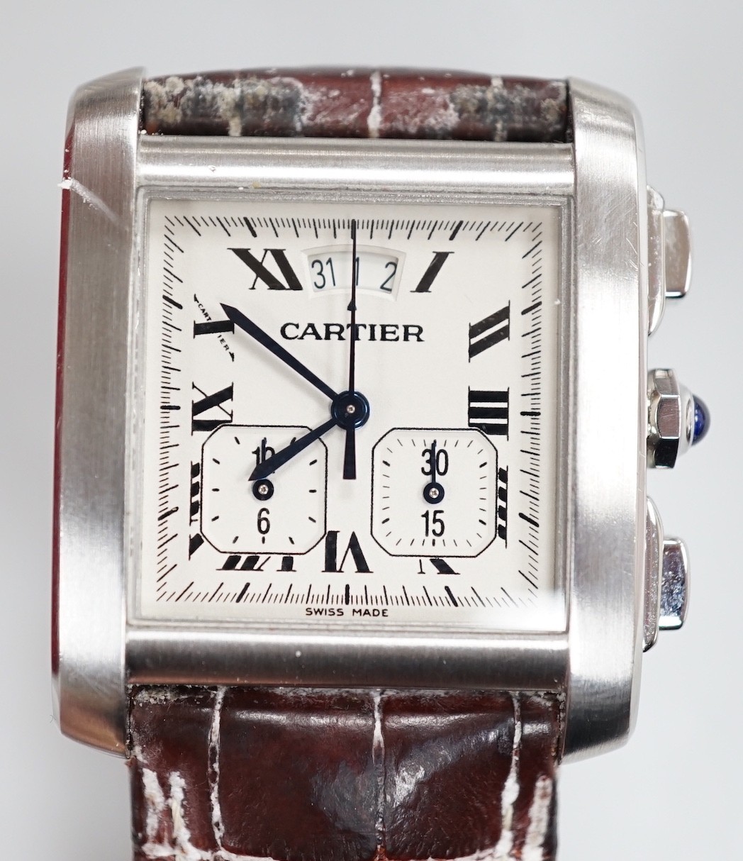 A gentleman's 2006 stainless steel Cartier Tank Francaise quartz wrist watch, with Roman numerals and two subsidiary dials, case diameter 30mm, with original Cartier box and booklets.